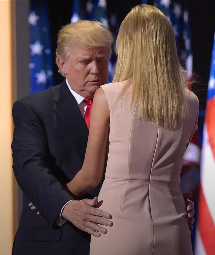 President Donald J. Trump gropes daughter Ivanka Trump's buttocks.