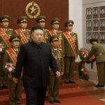 Kim Jong Un honors war dead.