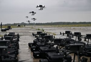 Drones in coordinated formation, reflective of operational swarm missions.